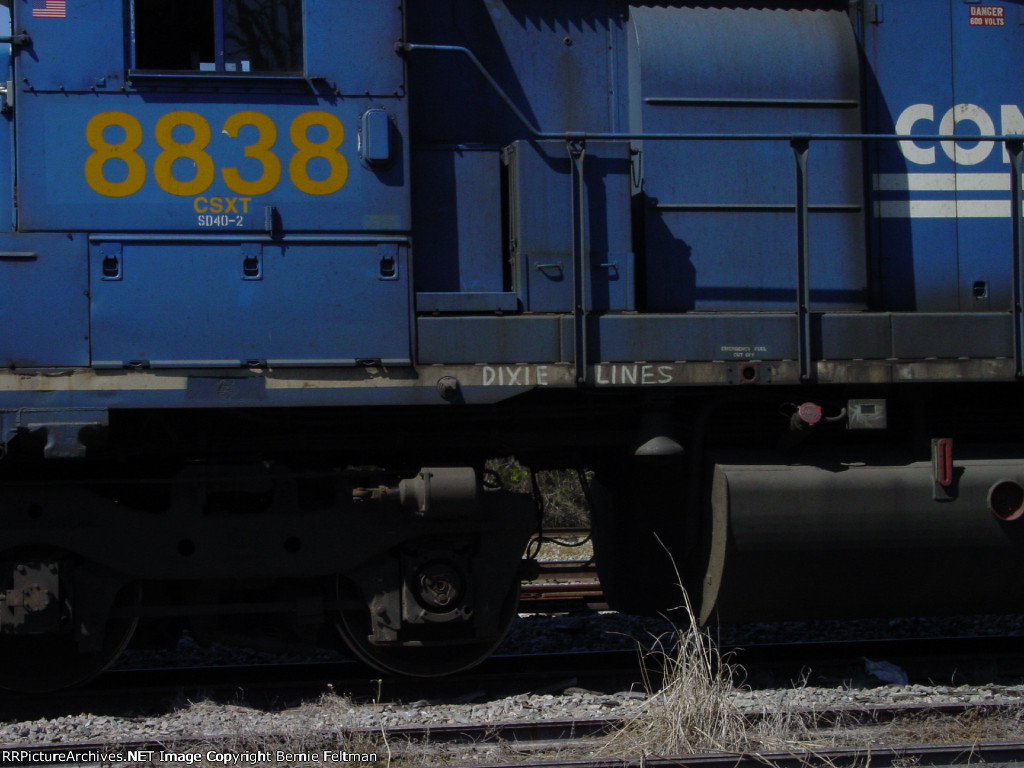 CSX SD40-2 #8838, with a homemade L&amp;N tribute in the grime covered white stripe on the frame, 